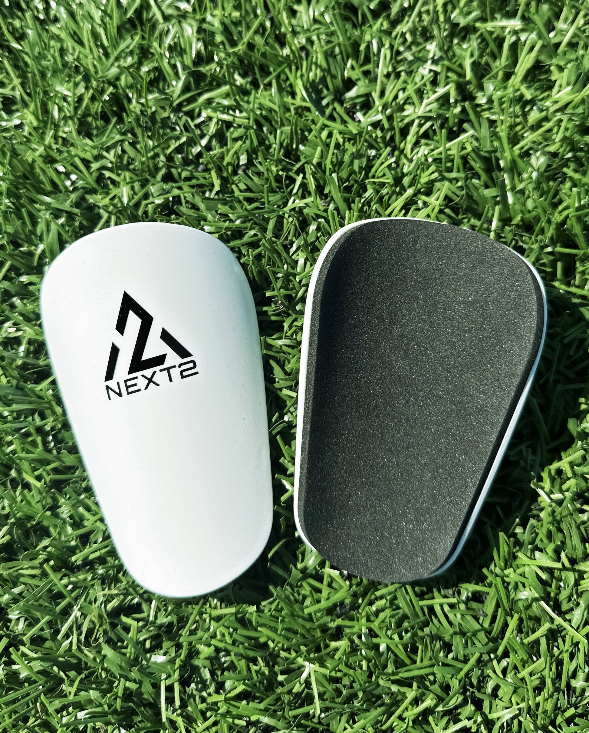 mini shin guards white