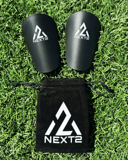 mini shin guards black