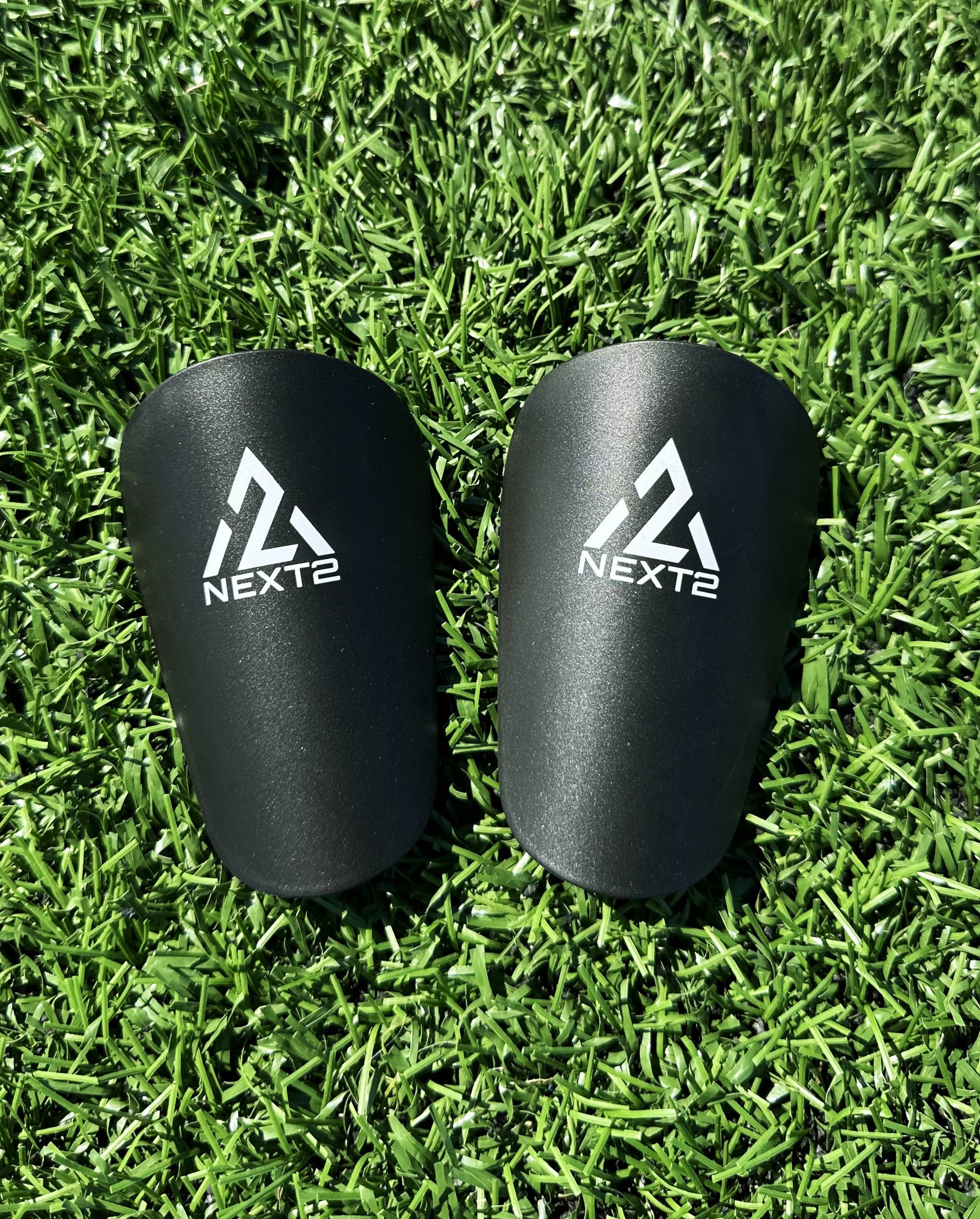 mini shin guards black